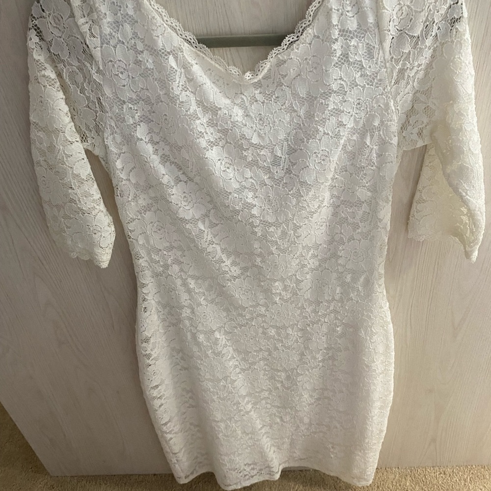 White lacy form fitting dress size 4